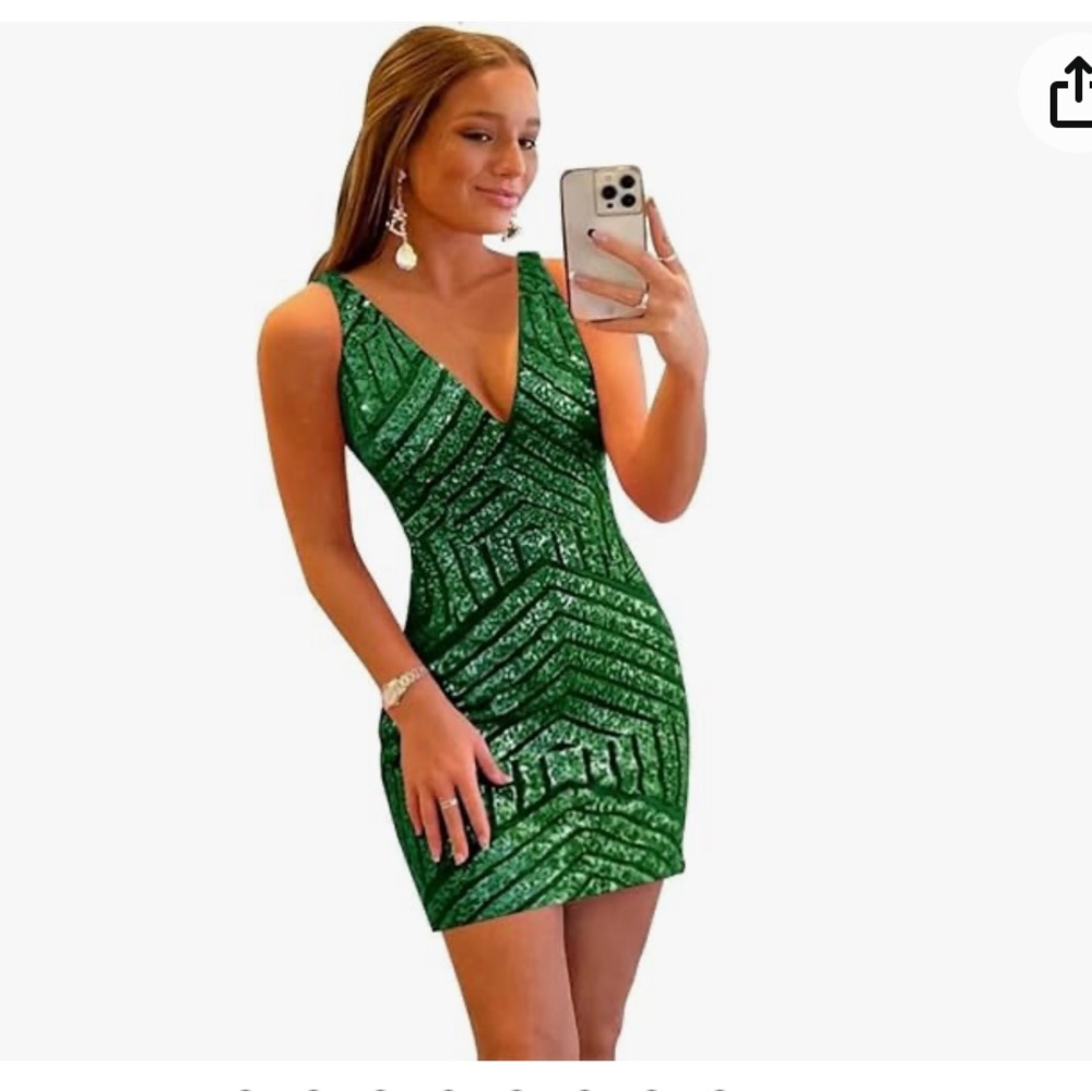 Emerald green dress; brand new never worn; has mesh on sides